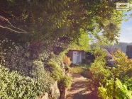 Gartenhütte mit kleinem Gartenanteil