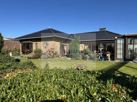 Außenansicht - Haus kaufen in Bassum - Gepflegter Bungalow in der Nähe vom Zentrum zu verkaufen