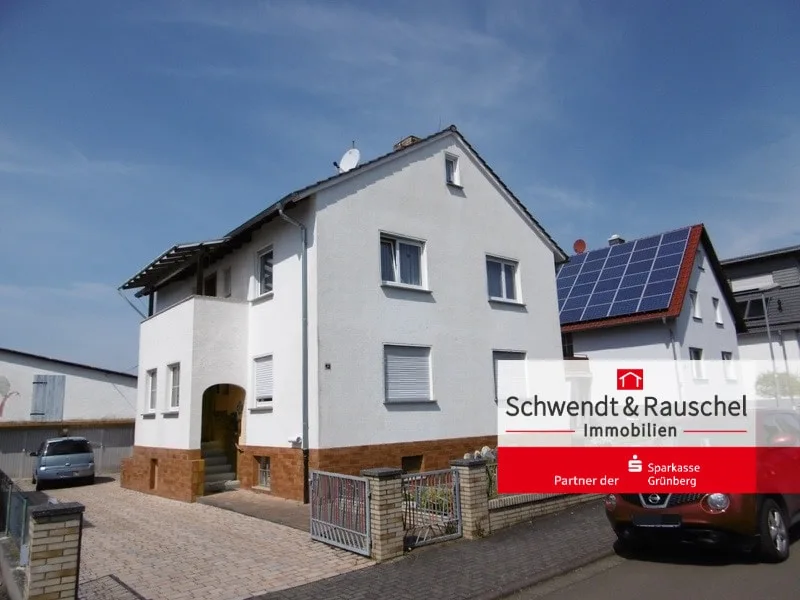 Strassenansicht - Haus kaufen in Grünberg - EFH mit Doppelgarage in Grünberg-Harbach