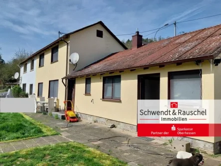 Rückansicht - Haus kaufen in Butzbach - Einfamilienhaus in Butzbach-Wiesental