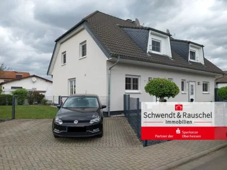 Frontansicht - Haus kaufen in Reichelsheim - Helle Doppelhaushälfte in Reichelsheim-Weckesheim
