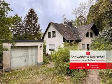 Ansicht Front - Haus kaufen in Niddatal - 1-FH mit ELW in Niddatal-Assenheim!