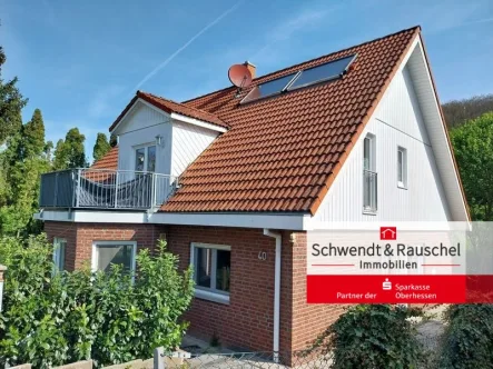 Frontansicht - Haus kaufen in Wehrheim - Ein-/Zweifamilienhaus in Wehrheim-Pfaffenwiesbach