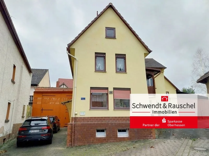 Frontansicht - Haus kaufen in Wölfersheim - Einfamilienhaus mit viel Nebengebäuden in Wölfersheim-Berstadt