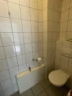 Toilette Zwischengang Bild 1