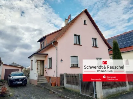 Frontansicht - Haus kaufen in Butzbach - Einfamilienhaus in Butzbach-Fauerbach