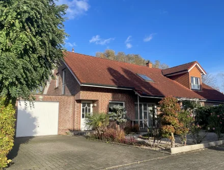  - Haus kaufen in Steinfurt - Vermietete Doppelhaushälfte mit großer Garage, nähe Gymnasium und B54 in Steinfurt-Burgsteinfurt