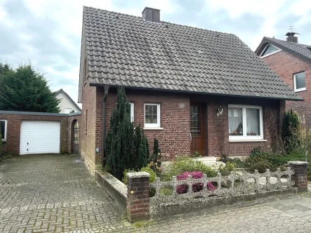 - Haus kaufen in Rheine - *Gestalten Sie Ihr neues Eigenheim*Charmantes Einfamilienhaus mit Teilkeller in Rheine-Schotthock