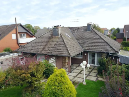  - Haus kaufen in Ibbenbüren - Schöner Bungalow in Siedlungslage von Laggenbeck!