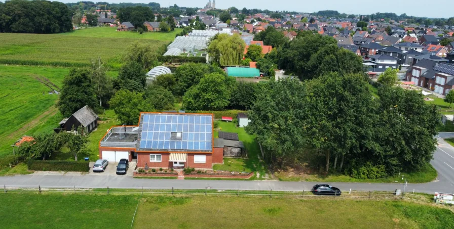  - Wohnung kaufen in Neuenkirchen - *im Grünen!*moderne Wohnung mit großer Dachterrasse,Klimaanlage und Garage in Neuenkirchen