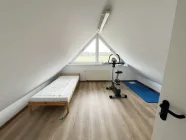 Weiteres Zimmer im Spitzboden