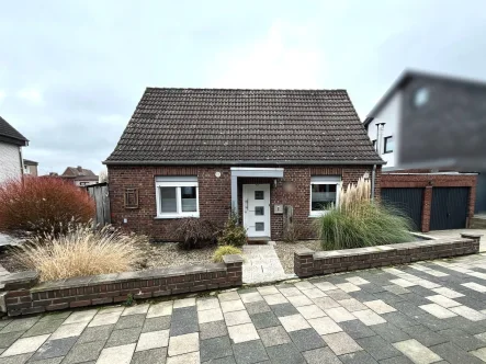  - Haus kaufen in Rheine - *Klein, fein, mein*Saniertes Einfamilienhaus mit Doppelgarage in Rheine-Dutum