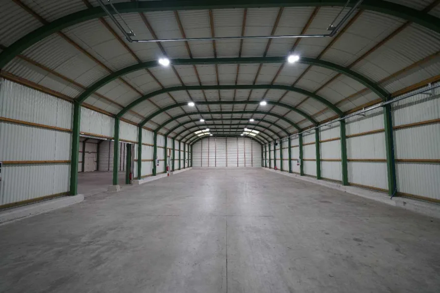 Halle 1 - Halle/Lager/Produktion mieten in Ratingen - Beheizbare Lager-/Produktionshalle mit drei Rolltoren und Freifläche