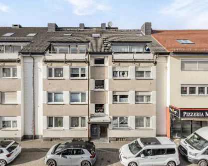 Frontansicht - Wohnung kaufen in Ratingen - Ideal aufgeteilte 2-Zimmer-Dachgeschosswohnung mit zwei Balkonen