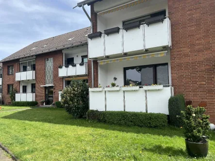 Hausansicht - Wohnung kaufen in Ratingen - Schöne 2-Zimmer-Eigentumswohnung mit Loggia in Ratingen-Tiefenbroich