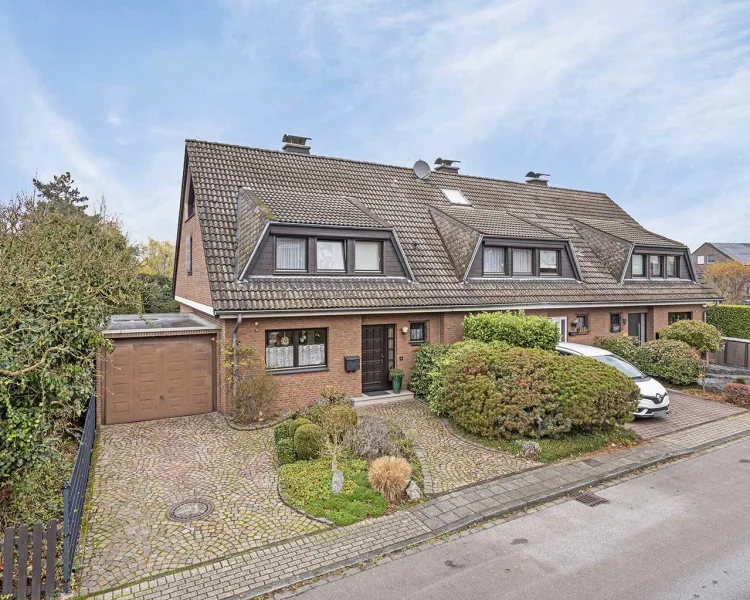  - Haus kaufen in Ratingen - Gepflegtes Reihenendhaus mit sonnigem Garten und Garage in Ratingen-Lintorf