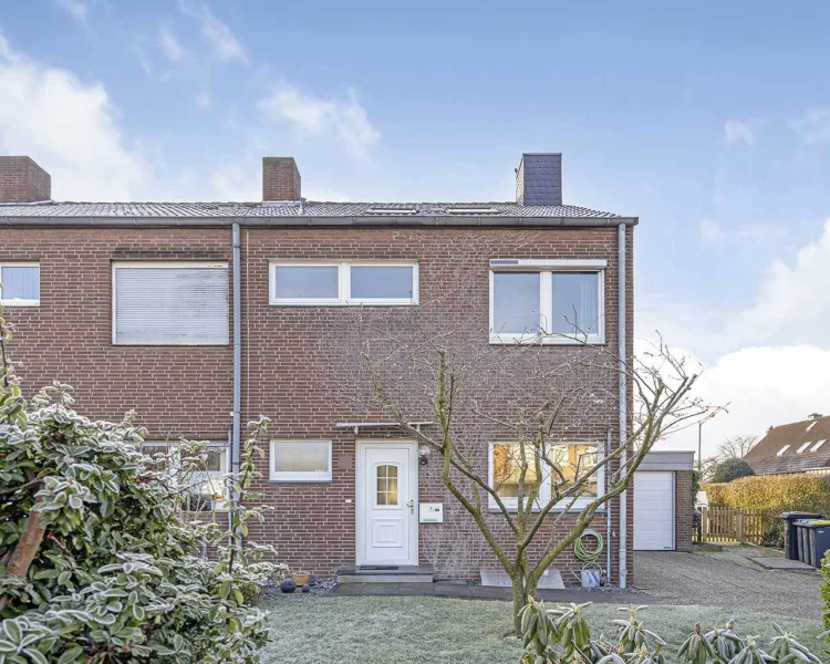 Frontansicht - Haus kaufen in Kaarst - Kaarst-Holzbüttgen - Gemütliches Reihenendhaus mit Südterrasse und Garage