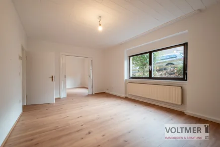 Wohnzimmer - Wohnung mieten in Neunkirchen - FREIRAUM - gemütliche 3-Zimmer-Wohnung mit Balkon und Gartenmitbenutzung in Neunkirchen!
