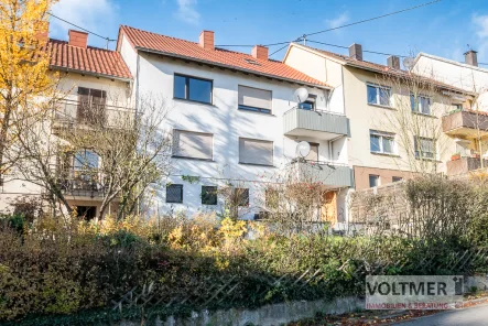 Straßenansicht - Haus kaufen in Neunkirchen/Saar - ERFÜLLUNG - teilrenoviertes Zweifamilienhaus mit Garage und Garten in Furpach!