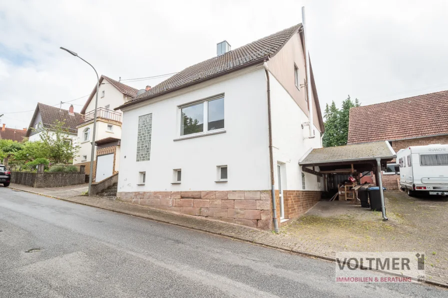 Straßenansicht - Haus kaufen in Etschberg - RESERVIERT - kleines Einfamilienhaus mit Carport in Etschberg!