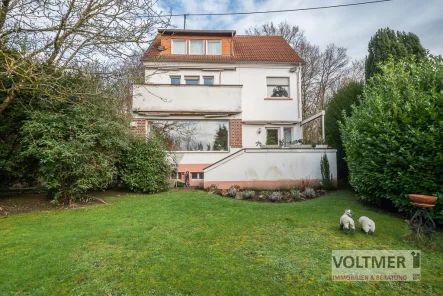 Straßenansicht - Haus kaufen in Neunkirchen/Saar - LIEBLINGSORT – großzügiges Einfamilienhaus mit Doppelgarage am Biedersberg!