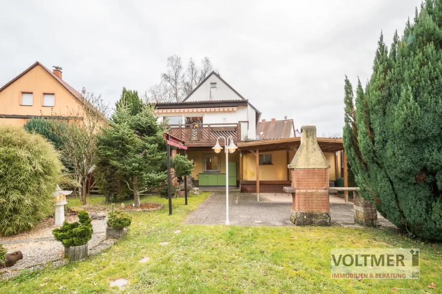 Rückansicht - Haus kaufen in Ottweiler - FAMILIENTRAUM - freistehendes Einfamilienhaus mit Doppelgarage, Doppelcarport & Garten in Ottweiler!