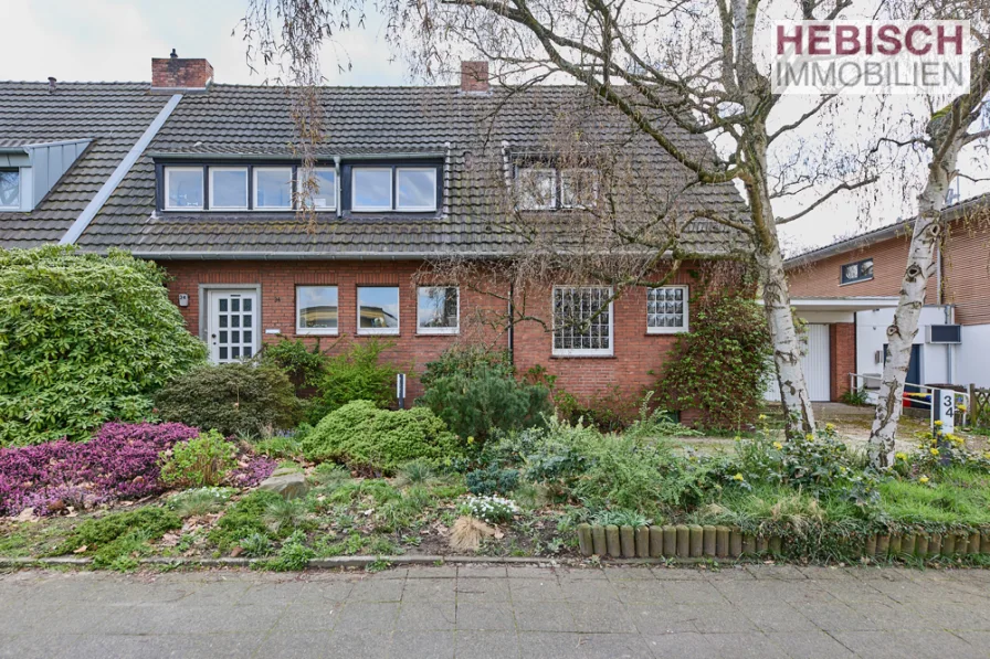 Front - Haus kaufen in Krefeld - + LICHTDURCHFLUTET + RAUMWUNDER MIT ARBEITSBEDARF +