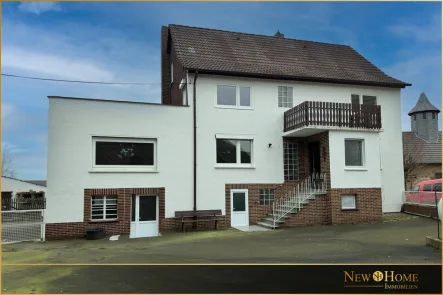 Titelfoto - Haus kaufen in Borken / Haarhausen - Saniertes Einfamilienhaus mit großzügigem Nebengebäude!