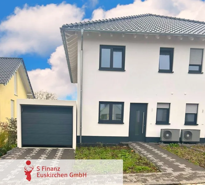  - Haus kaufen in Euskirchen - Euskirchen-Kirchheim: fertige Neubau-Doppelhaushälfte mit Garten und Garage! 360° Begehung