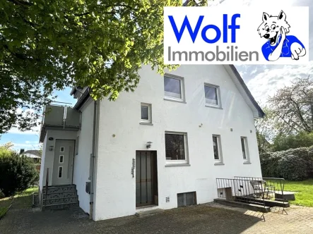 Ansicht - Haus kaufen in Bünde - 1-2 Familienhaus in ruhiger Lage von Ennigloh mit Keller, Garten und Garage