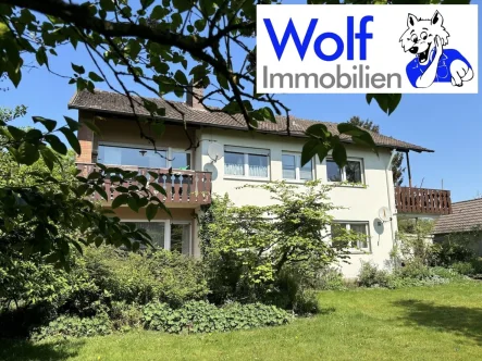Südansicht - Haus kaufen in Rödinghausen - Zweifamilienhaus -- Ländlich und trotzdem Ortsnah !