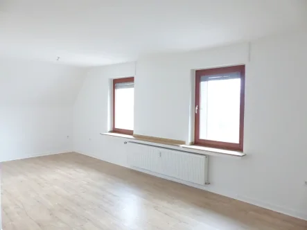 Wohnzimmer - Wohnung mieten in Recklinghausen - Renovierte Wohnung im gepflegten Zwei-Parteienhaus mit Garage in ruhiger Sackgasse von RE-Hochlar!