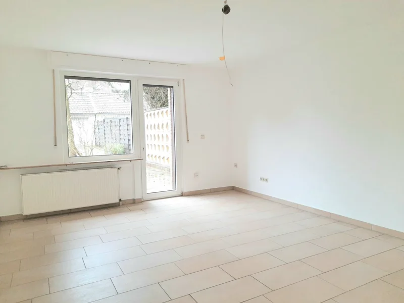 Wohnzimmer - Wohnung mieten in Recklinghausen - Renovierte, seniorenfreundliche Erdgeschosswohnung mit großer Terrasse in Recklinghausen-West!