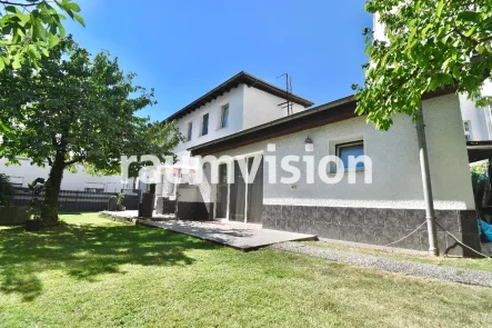 Seitenansicht - Haus kaufen in Solingen - Modernes Einfamilienhaus mit Terrasse und Garten 