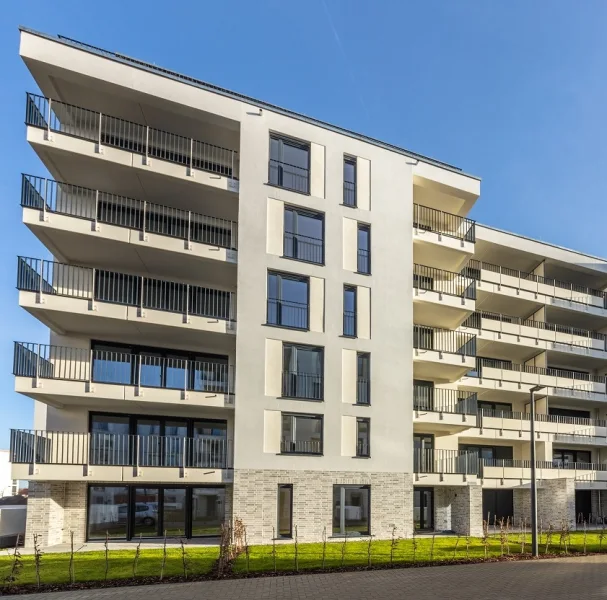 Neue Mitte Schönefeld Außenansicht (1) Dez. 2023 - Wohnung kaufen in Schönefeld - Wohntraum auf ca. 77 m²! Tolle 3-Zimmer Wohnung mit Dachterrasse