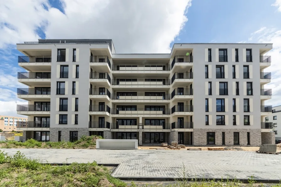 Außenansicht 6 - Wohnung kaufen in Schönefeld - Erstbezug im Neubau: Schöne Gartenwohnung mit 3 Zimmern und offenem Wohn-/ Kochbereich in Schönefeld