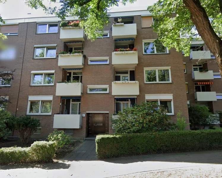 Hausfront - Wohnung kaufen in Düsseldorf - Zwei Balkone, drei Zimmer und ein Tiefgaragenstellplatz – Ihre neue Etagenwohnung!