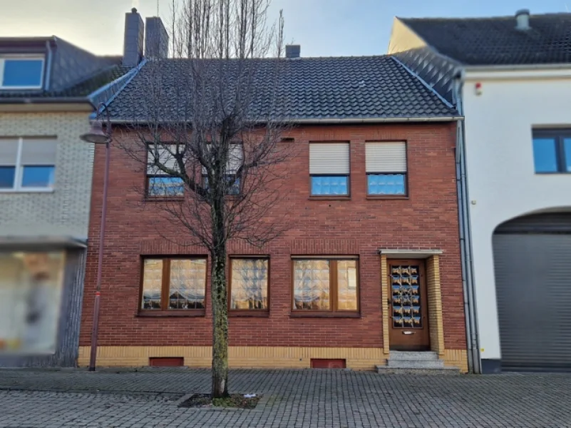 Straßenansicht - Haus kaufen in Aldenhoven-Siersdorf - Solides Reihenmittelhaus mit kleinem Innenhof