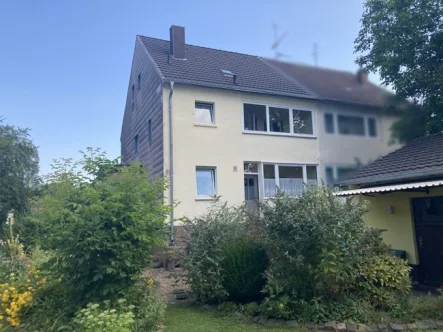 Gartenansicht 1 - Haus kaufen in Düren - Doppelhaushälfte mit Charme und tollem Grundstück in zentrumsnaher Lage von Düren