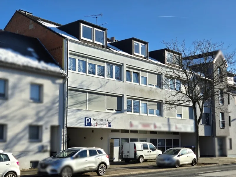 Straßenansicht - Haus kaufen in Düren-Niederau - Großzügiges Wohn- und Geschäftshaus - voll vermietet!