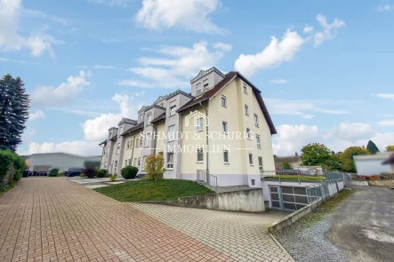 Schmidt & Schurig Immobilien - Wohnung kaufen in Sulzfeld - Etagenwohnung mit Balkon in ruhiger Lage!
