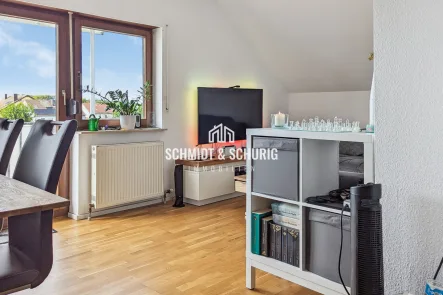 Schmidt & Schurig Immobilien - Wohnung kaufen in Karlsdorf-Neuthard / Karlsdorf - Vermietete Wohnung mit Garage in Karlsdorf-Neuthard.