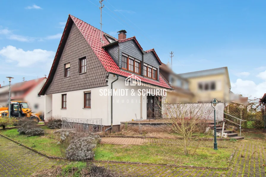 Schmidt & Schurig Immobilien - Haus kaufen in Karlsruhe / Neureut - Charmantes Einfamilienhaus mit Potenzial in Karlsruhe/Neureut