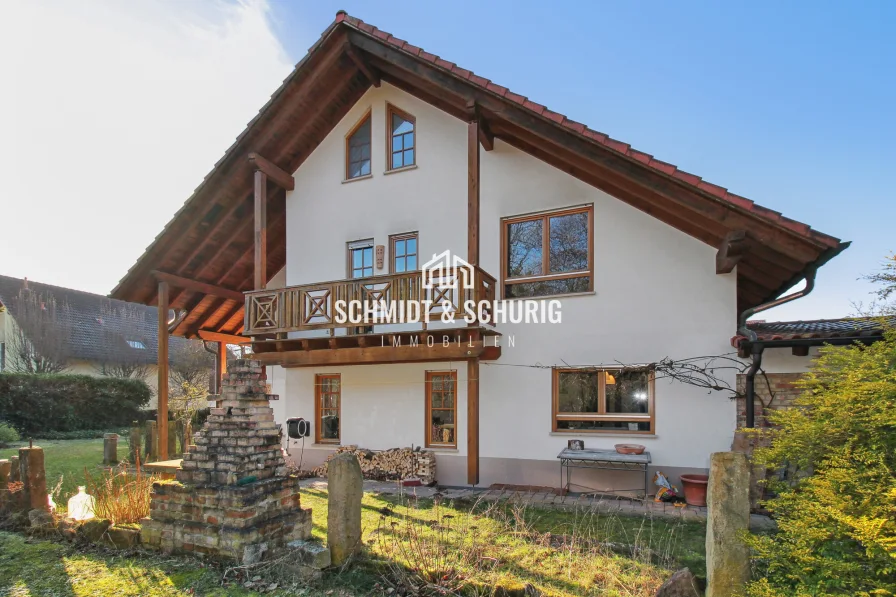 Schmidt & Schurig Immobilien - Haus kaufen in Philippsburg / Huttenheim - Einfamilienhaus mit großzügigem Garten – Ihr neues Zuhause in idyllischer Lage.