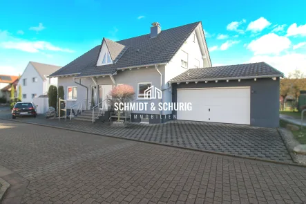 Schmidt & Schurig Immobilien - Haus kaufen in Kronau - Willkommen in Ihrem Traumhaus in Kronau! Einfamilienhaus mit großem Garten.