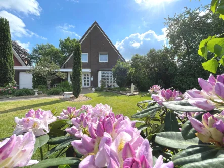 Hausansicht - Haus kaufen in Stadtlohn - Auf ins Familiennest! Einfamilienhaus mit Garage in Stadtlohn