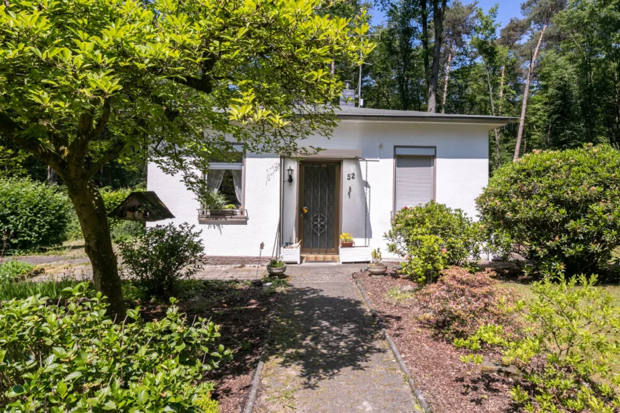 Exposéfoto - Haus kaufen in Rösrath - Rösrath: Wohnen am Rande der Wahner Heide: Freistehendes Einfamilienhaus auf großem Grundstück!