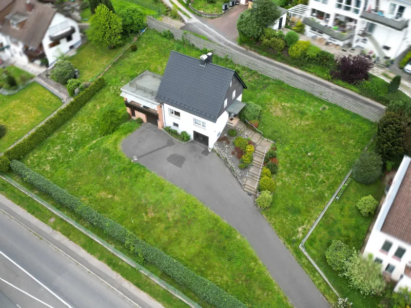 Objektansicht - Haus kaufen in Overath - Overath-Brombach: Freistehendes Ein- bis Zweifamilienhaus mit vielen Optionen in schöner Höhenlage