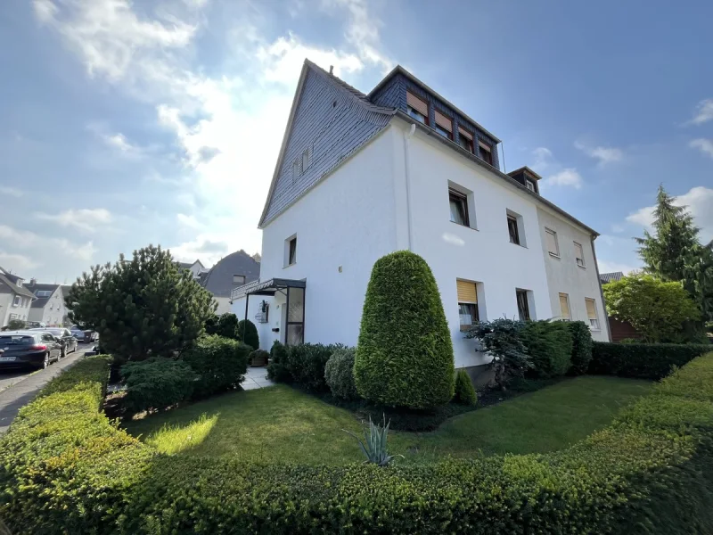 Frontansicht - Haus kaufen in Bergisch Gladbach - Bergisch Gladbach - Heidkamp:Einfamilienhaus in der Gartensiedlung Gronauerwald