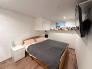 Schlafzimmer Souterrainwohnung